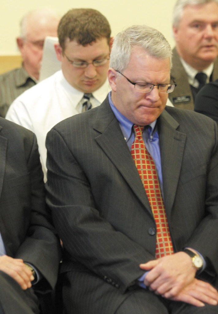 Former Maine Turnpike Authority executive director Paul Violette reacts while listening to testimony from Beth Ashcroft, director of the Office of Program Evaluation and Government Accountability, during a hearing before the Legislature's Government Oversight Committee at the State House in Augusta on Friday.