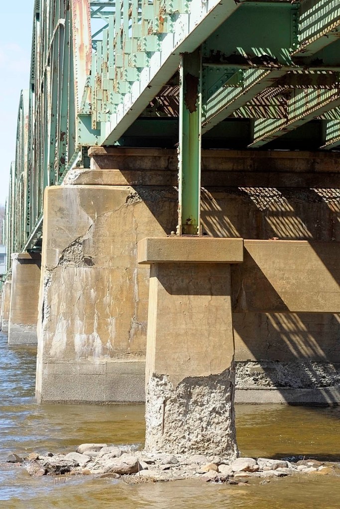 The concrete supports under the Richmond Dresden Bridge near the Dresden shoreline have cracking and wear.