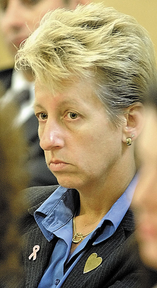 INTERESTED PARTY: Warden Patricia Barnhart sits in the audience listening to testimony during a Government Oversight Committee hearing about the Thomaston land sale on Tuesday morning in Augusta.