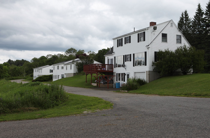 Three houses in Thomaston that were recently sold to the current state prison warden.