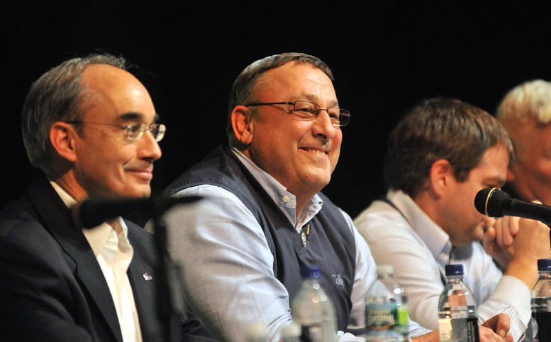 MAINERS' APPROVAL: A statewide survey released Wednesday shows a surge in the job approval rating of Gov. Paul LePage, center, and that unemployment now ranks as the most important issue facing Maine.
