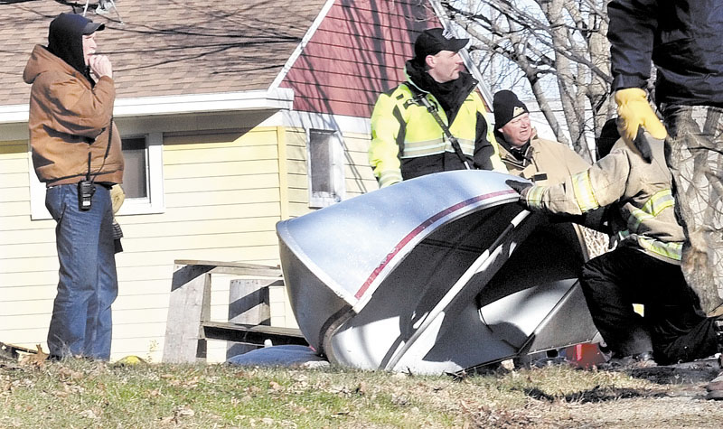 HUNTING HIGH AND LOW: Waterville and Winslow fire personnel and game wardens conducted another extensive search of yards and outbuildings at all residences on Violette Avenue in Waterville and surrounding streets for any signs of missing girl Ayla Reynolds on Tuesday.