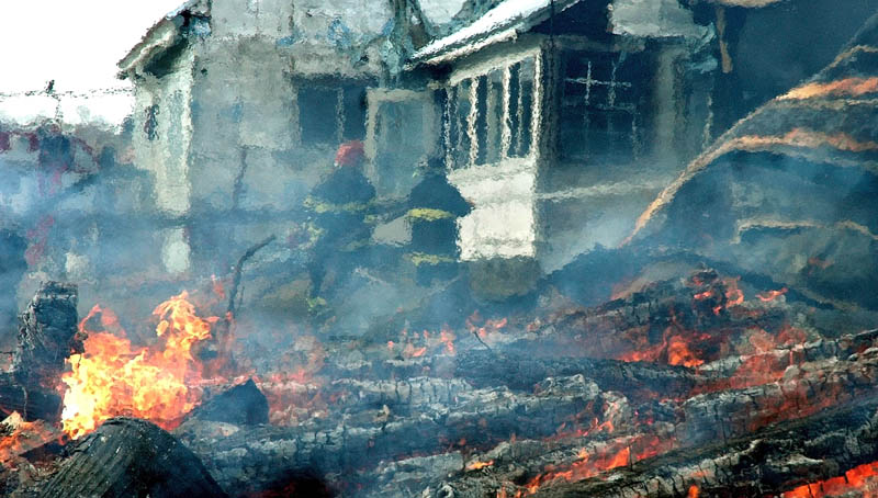 Firefighters from several towns battled a blaze Thursday morning on Brighton Road, Route 151, that destroyed a large barn and part of the adjoining farm house. The residents said they were insured.