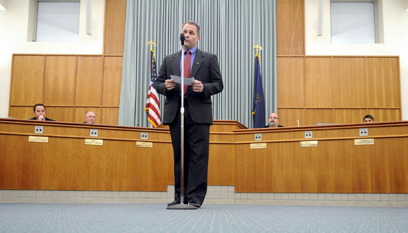 Jeffrey Bilodeau addresses fellow Augusta city councilors and guests attending Thursday’s council meeting at Augusta City Center. Bilodeau, a major with the Maine Army National Guard, was sworn in for his first term on the City Council. Returning councilors and members of the school board were also sworn in.