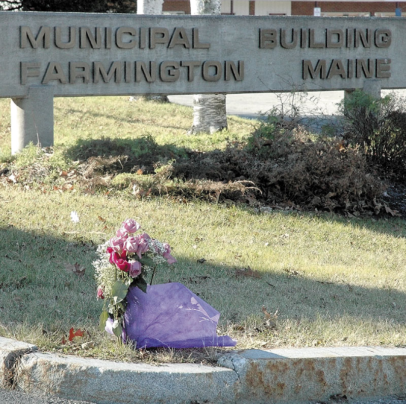 MEMORIAL: Flowers were left early Tuesday by Ruth Crowley, the mother of former U.S. Army Ranger Justin Crowley-Smilek, who was shot to death by a police officer near that spot on Saturday.