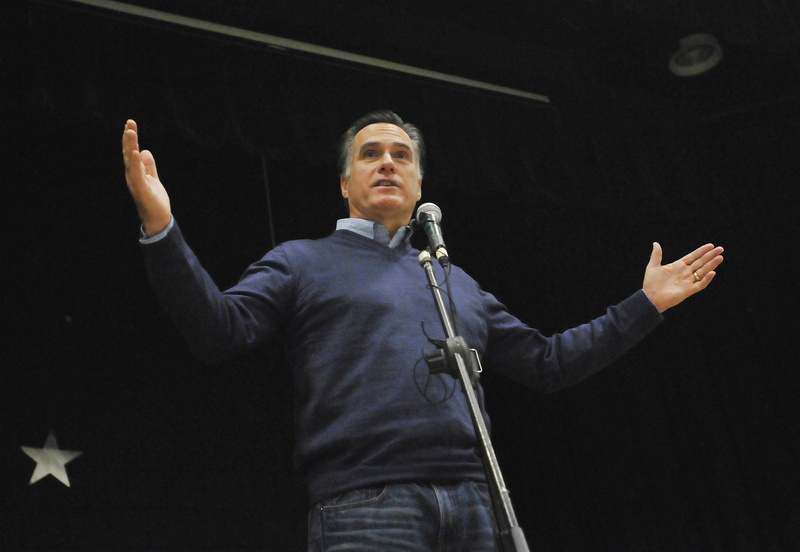 WINNER: Mitt Romney speaks during the Portland Republican City Committee Caucus at Riverton Elementary School on Saturday.