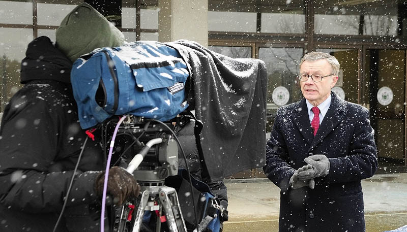IN THE PUBLIC EYE: Maine State Police spokesman Steve McCausland stands in the snow outside the Department of Public Safety in Augusta as he is interviewed via satellite about the Ayla Reynolds case on a national news show on Tuesday afternoon.