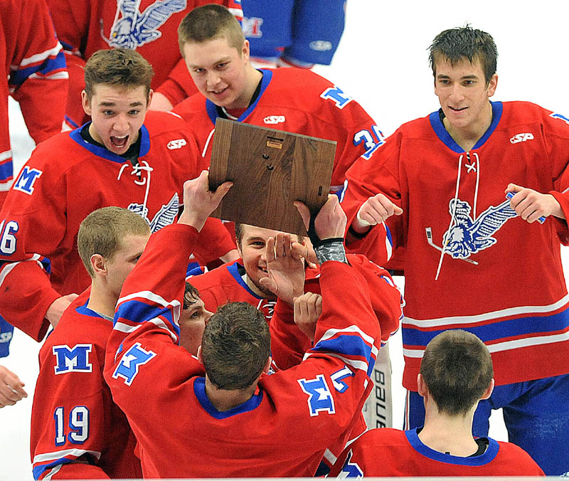 Photo by Michael G. Seamans in the third period of the Class B East hockey regional finals at Alfond Arena at the University of Maine in Orono Tuesday night. Messalonskee defeated Brewer 5-2.