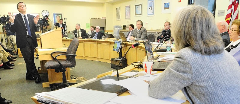 Staff photo by Joe Phelan Commissioner of Education Steve Bowen, left, answers a question from Education Committee member Rep. Mary Nelson, D-Falmouth, bottom right, during a public hearing on LD 1854 and LD1886 on Thursday afternoon in the Cross State Office Building in Augusta.