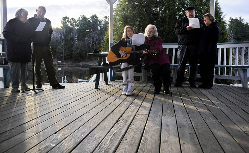 Members of the Dresden Richmond United Methodist Church greet Easter with a sunrise service Sunday at the Richmond gazebo on the Kennebec River.