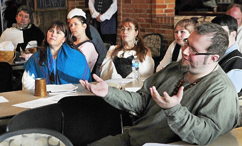 Peter Olsen, who goes by Magnus Hvalmagi, asks a question during The East Kingdom Brewers' Collegium event sponsored by the Society for Creative Anachronism on Saturday at the River Back Dance Club in Augusta.