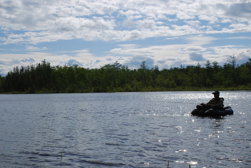 Jerry Derosier of Wells fishes Mud Pond in Embden in the late afternoon Tuesday. He fished for two hours in a float tube and caught nothing, which is what the biologists running the Maine Brook Trout Pond Survey program expected. But Derosier’s trip saved state biologists from having to travel to the pond.