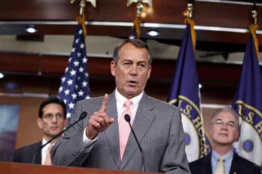 FILE - In this June 28, 2012 file photo, House Speaker John Boehner of Ohio, flanked by House Majority Leader Eric Cantor of Va., left, and Rep. Tom Price, R-Ga., speaks during a news conference on Capitol Hill in Washington. It looks like a tax, smells like a tax, and the Supreme Court says it must be a tax. But politicians in both parties are squirming over how to define the Thing in President Barack Obama's health care law that requires people to pay up if they don't get health insurance. The problem for Obama is that, if the Thing is indeed a tax, he is by definition a raiser of taxes on the middle class, which he promised not to be. If that sounds like an opportunity for Republican presidential rival Mitt Romney, well, it's not that simple. (AP Photo/J. Scott Applewhite, File)