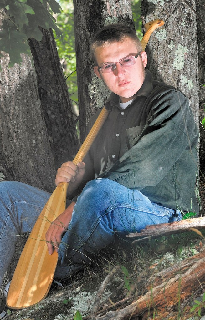 Benton Purnell, 17, of Oakland, poses for a portrait at his parent's McGrath Pond Road home Thursday. Purnell spent the summer paddling the Mississippi River from Minnesota to the Gulf of Mexico.