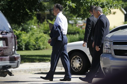 In this photo taken July 1, 2012, Republican presidential candidate Mitt Romney arrives at The Church of Jesus Christ of Latter-Day Saints in Wolfeboro, N.H. Romney, the first Mormon to clinch the presidential nomination of a major party, attended services Sunday with his wife, Ann, five sons, five daughters-in-law and eighteen grandchildren. (AP Photo/Charles Dharapak)