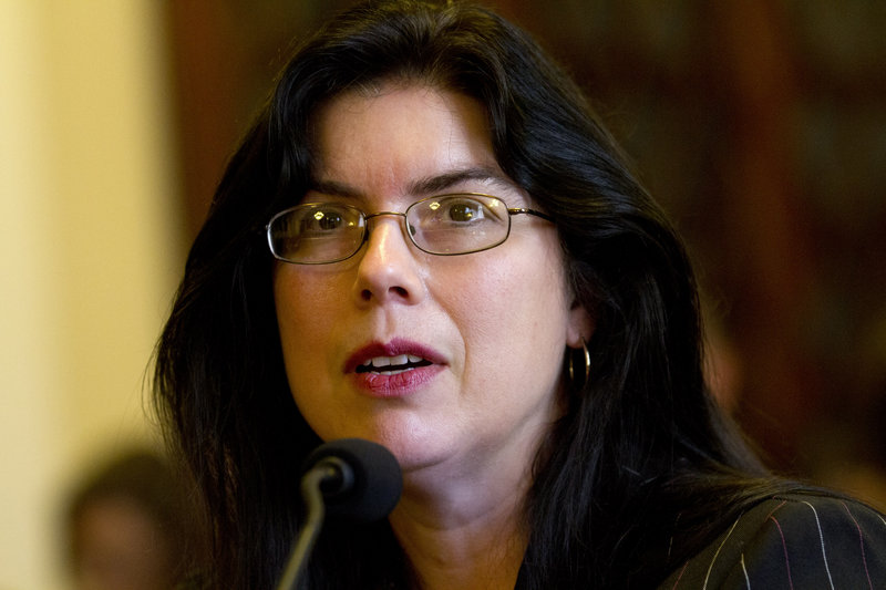 Ruth Moore of Milbridge, Maine, who was raped twice while serving in the Navy, testifies at a Veterans Affairs subcommittee on Disability Assistance and Memorial Affairs hearing about victims of military sexual trauma, on Capitol Hill in Washington, Wednesday, July 18, 2012. (AP Photo/Jacquelyn Martin)