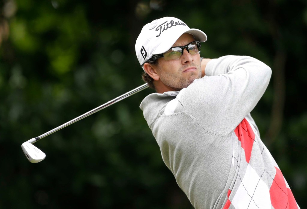 Adam Scott tees off today in the third round of the British Open at Royal Lytham & St Annes golf club in England. Scott takes a four-shot lead into Sunday's final round.