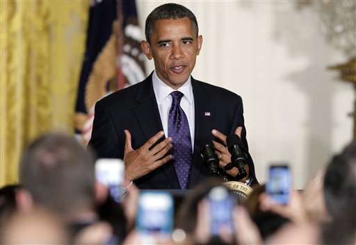 FILE - In this May 30, 2012 file photo, President Barack Obama speaks at a Jewish American Heritage Month reception in the East Room at the White House in Washington. Mitt Romney is trying to win over a tiny sliver of a small _ but powerful _ section of the American electorate on a trip to Israel. President Barack Obama is doing the same at home. Romney�s international trip is unlikely to change the broader campaign with Obama but Romney is looking to close the gap among a Jewish electorate. (AP Photo/Charles Dharapak, File)