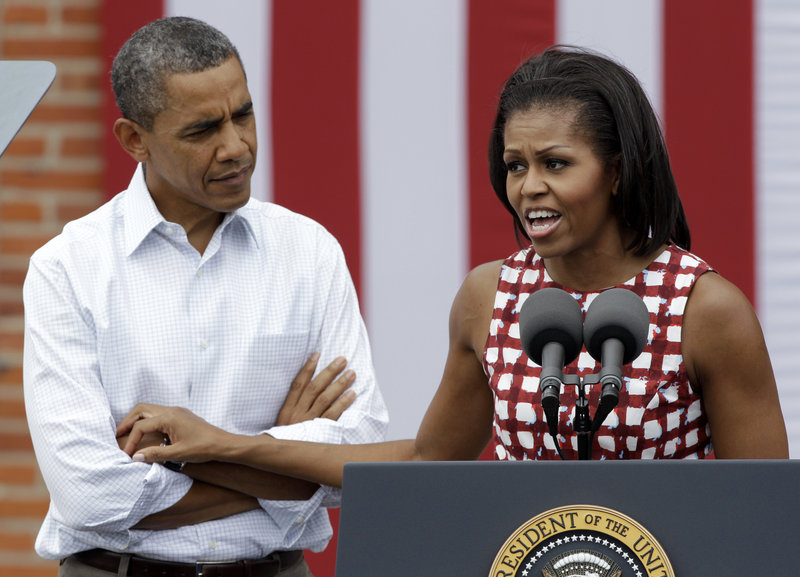 President Obama and his wife campaign together last week in Dubuque, Iowa. The first couple have been sharing their personal narratives on the campaign trail, trying to counter Republican attacks.