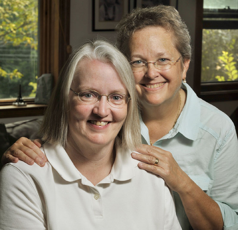 Sarah Dowling, left, and Linda Wolfe had what they call a “nonlegal wedding” in Maine 16 years ago, followed by a civil union in Vermont on their fifth anniversary. They have taken numerous legal and financial steps to protect themselves and their 11-year-old daughter. When it comes to health insurance, they pay taxes that heterosexual couples don’t pay.