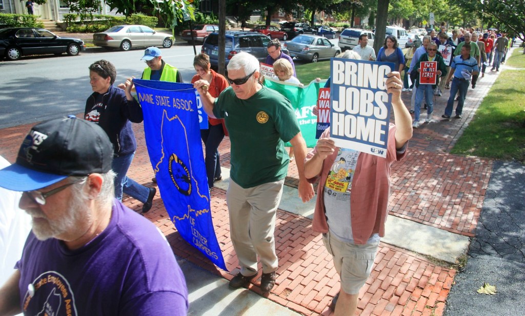 Jill Brady/Staff Photographer: Attendees at the Portland Labor Breakfast at the Maine Irish Heritage Center conclude the event with a march along State Street to Longfellow Square for a brief poetry reading in Portland Monday, September 3, 2012.