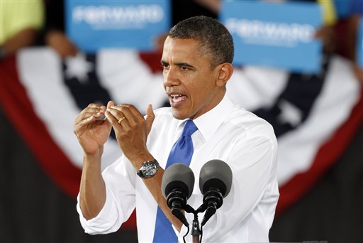 President Barack Obama gestures during a rally in Virginia Beach, Va., Thursday, Sept. 27, 2012. (AP Photo/Steve Helber)