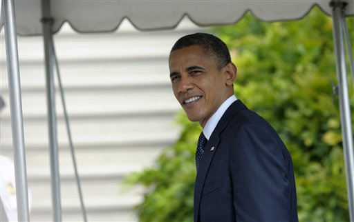 President Barack Obama answers a question as he returns to the the White House in Washington, Tuesday, Sept. 25, 2012. (AP Photo/Susan Walsh)