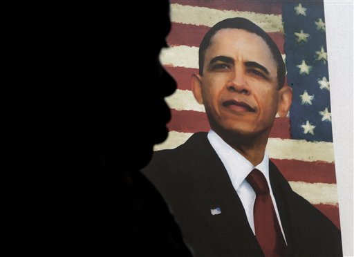 A volunteer waits to receive credentials for President Barak Obama's acceptance speech during Charlotte's Democratic Convention at a campaign field office in Raleigh, N.C., Thursday, Aug. 23, 2012. (AP Photo/Gerry Broome)