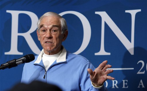 FILE - In this Jan 28, 2012 file photo, Republican presidential candidate Rep. Ron Paul, R-Texas, campaigns at the University of Southern Maine in Gorham, Maine. At a raucous GOP state convention that was taken over by Ron Paul forces, supporters of the libertarian-leaning Texas congressman captured 21 of 24 of Maine's delegate seats to the national convention, set for Aug. 27-30. (AP Photo/Robert F. Bukaty, File)