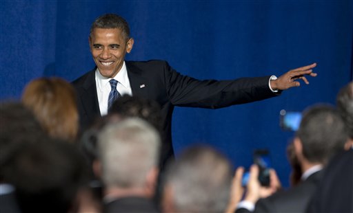 In this Oct. 11, 2012, file photo, President Barack Obama arrives at a campaign fundraiser at the JW Marriott Marquis Miami. (AP Photo/Carolyn Kaster, File)