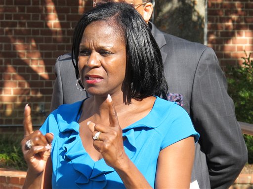 Using sign language, Angela McCaskill, chief diversity officer at Gallaudet University, addresses an Oct. 16 news conference about being placed on leave after signing a petition to put Maryland's same-sex marriage law on the ballot for voters to decide. She is asking to be reinstated to her position at Gallaudet, a university in Washington, D.C., for the deaf and hard of hearing.