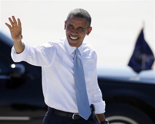 President Barack Obama waves to supporters as he arrives at McCarran International Airport in Las Vegas on Sunday. He has one mission heading into his first debate with Republican Mitt Romney: Don't screw things up.