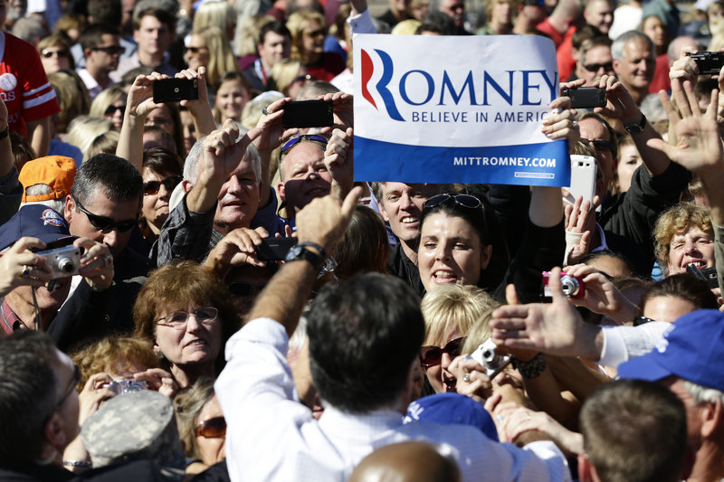 Republican presidential candidate Mitt Romney campaigns at the Mobility Supercenter in Richmond, Va., on Friday. He’s seeing bigger crowds since the presidential debate.