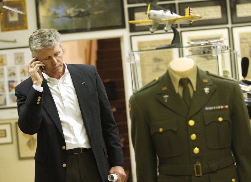 The candidate takes a call as he was waiting for primary results in June at his headquarters, the Maine Military Museum and Learning Center in South Portland. Charlie Summers won the six-way contest for the Republican nomination.