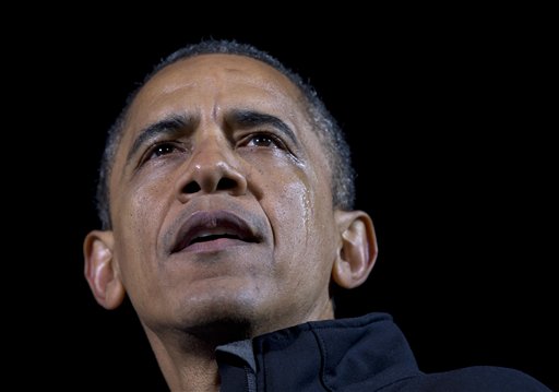 President Barack Obama speaks, as a tear streams down his face, at his final campaign stop on the evening before the 2012 presidential election, Monday, Nov. 5, 2012, in Des Moines, Iowa. (AP Photo/Carolyn Kaster)