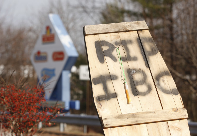 Striking workers erected a board shaped like a coffin lid after Hostess announced it would start proceedings to liquidate the company.