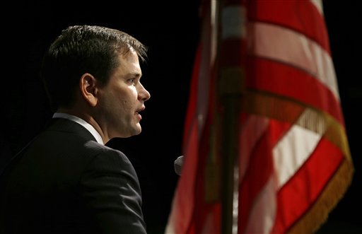 FILE - In this Saturday, Nov. 17, 2012 file photo, U.S. Sen. Marco Rubio, R-Fla., speaks during Iowa Gov. Terry Branstad's annual birthday fundraiser in Altoona, Iowa. Rubio and other prominent Republicans are calling for a sweeping review of how to prevent tragedies like the Newtown, Conn., massacre. For years, Republicans have adhered fiercely to their bedrock conservative principles, resisting Democratic calls for tax hikes, comprehensive immigration reform and gun control. Now, seven weeks after an electoral drubbing, some party leaders and rank-and-file alike are signaling a willingness to bend on all three issues. (AP Photo/Charlie Neibergall)