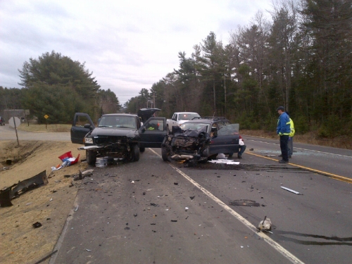 State police investigate the fatal accident on Route 17, in the Coopers Mills section near the Windsor-Whitefield town line, on Friday.