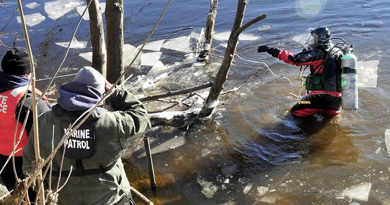 Maine State Police diver Jarod Stedman encountered sunken wood and floating pieces of ice while searching underwater for signs of missing toddler Ayla Reynolds in the Kennebec River near the boat launch off Water Street in Waterville on Jan. 11.