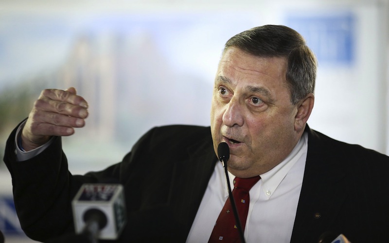 Gov. Paul LePage gestures during a press conference at the University of New England's College of Dental Medicine Patient Care Center Building, Tuesday, January 15, 2013. A municipal group estimates all of his new budget initiatives would cost towns and cities $420 million.