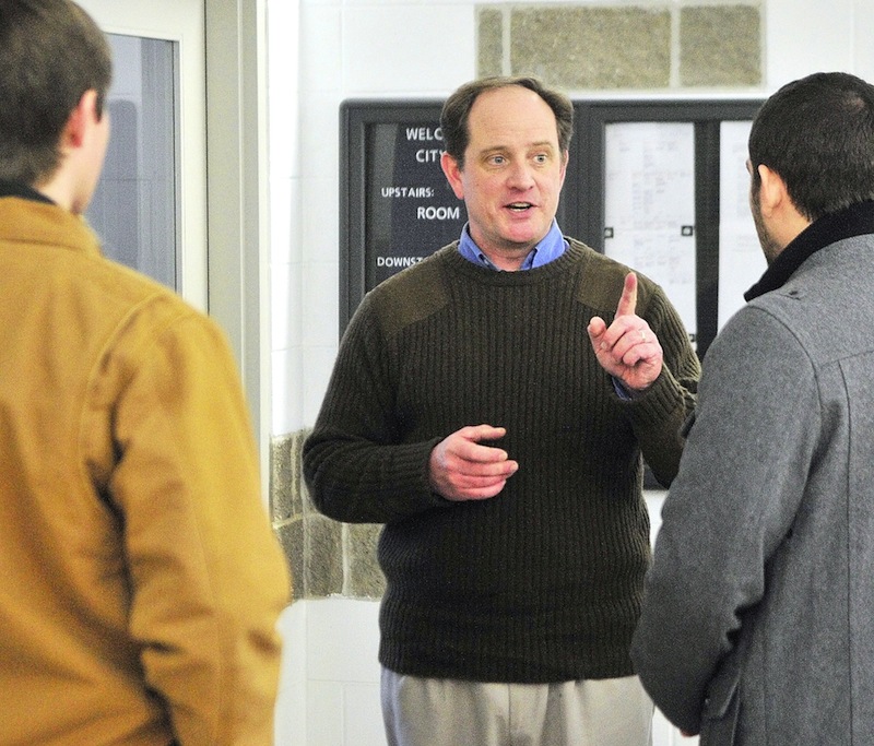 Mark Willis, Republican National Committeeman for Maine, talks to fellow party members on Saturday Jan. 12, 2013 after a state committee meeting in Augusta City Center.