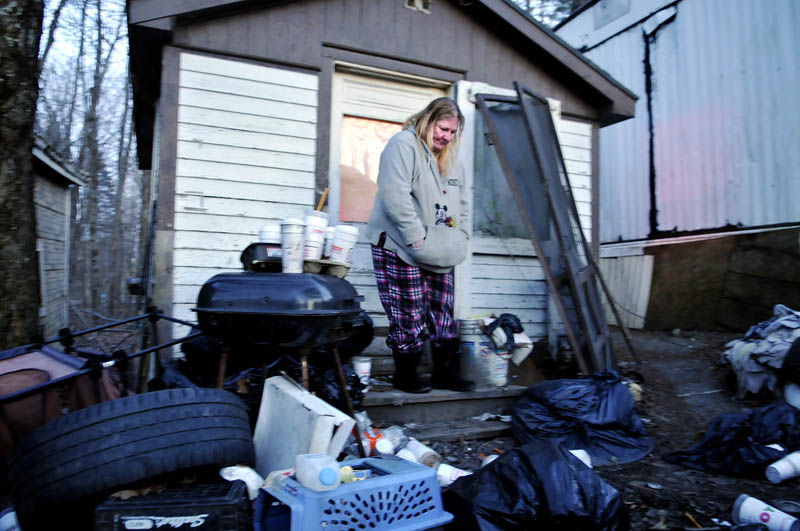 Becky Ratcliff stays in an outbuilding she describes as a "bedroom" on the China property of her mother, Judith Farris, in China.