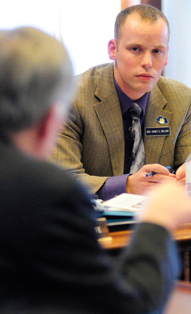 Rep. Corey Wilson, right, listens as corrections Commissioner Joseph Ponte answers his questions about plans to close the Central Maine Pre-Release Center in Hallowell ,during a meeting of the Legislature's Criminal Justice and Public Safety committee on Monday, on the fourth floor of the State House in Augusta.