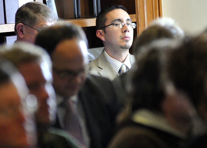 RSU 2 Superintendent Virgel Hammonds listens to Maine Commissioner of Education Stephen Bowen present projected state subsidies for school districts on Monday during a hearing of the Legislature's Appropriations and Education committees in Augusta.