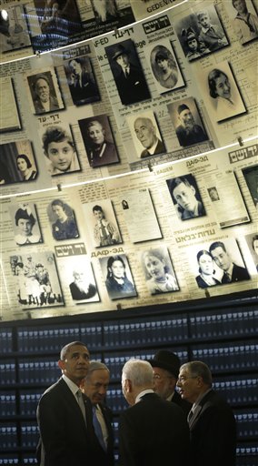 U.S. President Barack Obama, left, looks up during his visit to the Hall of Names at the Yad Vashem Holocaust Memorial in Jerusalem, Israel, Friday, March 22, 2013. With Obama are from left to right, Israeli Prime Minister Benjamin Netanyahu, Israeli President Shimon Peres, Rabbi Israel Meir Lau, and Chairman of the Memorial Avner Shalev. (AP Photo/Pablo Martinez Monsivais)