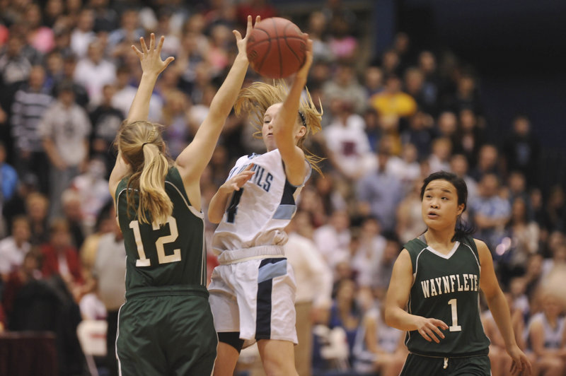 Martha Veroneau of Waynflete forces Maddy McVicar of Calais into a pass during Waynflete’s 59-55 victory on Saturday night. Veroneau is among the finalists for the Maine Association of Basketball Coaches' Mr. and Miss Basketball award.