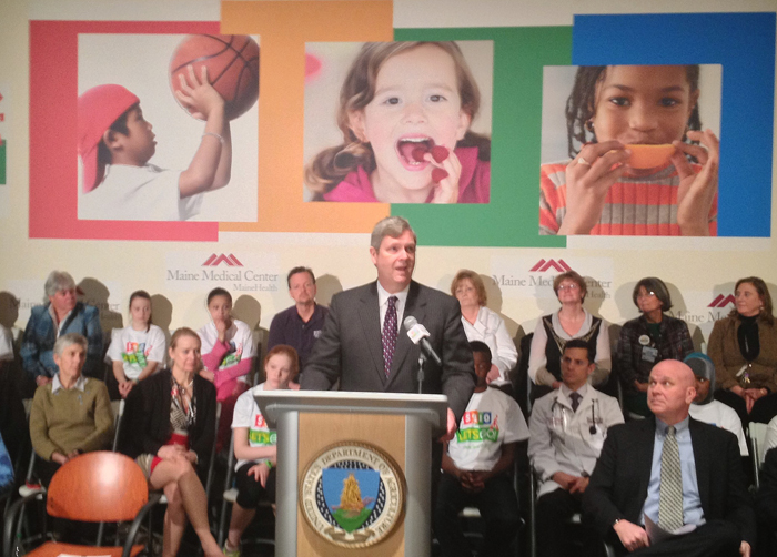 U.S. Secretary of Agriculture Tom Vilsack speaks to an audience at Maine Medical Center Thursday in Portland. Nutrition and exercise have to become "ingrained in the way people live and the way people do business," he said.