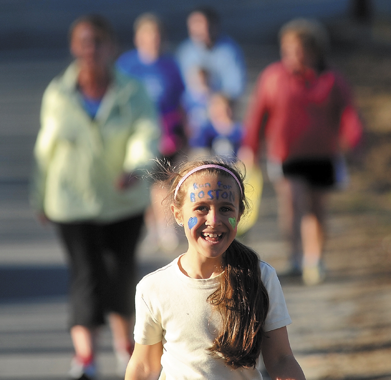 Even as authorities tracked down leads and possible suspects in the Boston Marathon bombings, the Couch-to-5K running group was out on Depot Road in Belgrade Wednesday to participate in the informal, but national, Run for Boston. Runners across the country hit the roads to show support for the people of Boston. Leading the way in Belgrade was Camdyn LaMarre, 8, who was one of the dozen or so runners who took part.