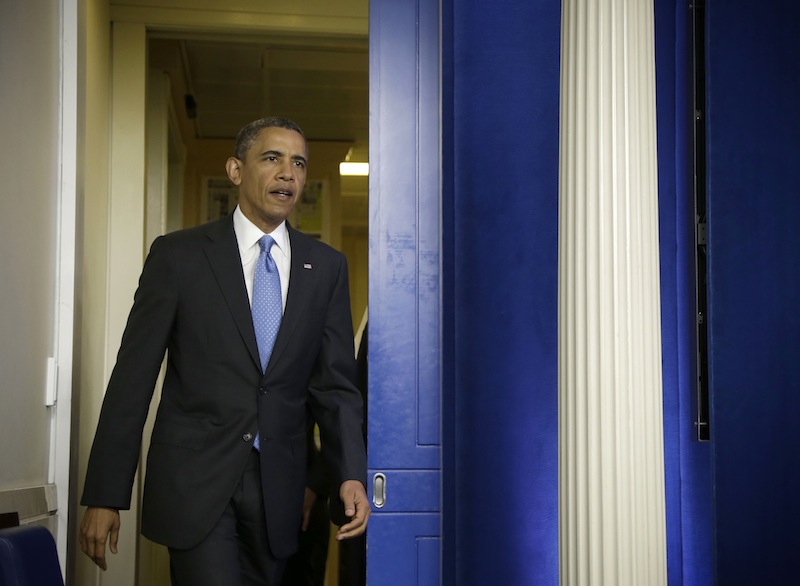 President Barack Obama arrives for a new conference in the Brady Press Briefing Room of the White House in Washington, Tuesday, April 30, 2013. (AP Photo/Evan Vucci)