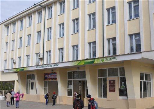 Children play in front of School No. 1 in Makhachkala, the capital of Dagestan, a predominantly Muslim republic in southern Russia, on Friday. Dzhokhar Tsarnaev, the surviving Boston bomb suspect, said on the social networking site VKontakte that he attended the school from 1999 until 2001. The school principal's secretary told the AP that Tsarnaev moved to the U.S. in March 2002.